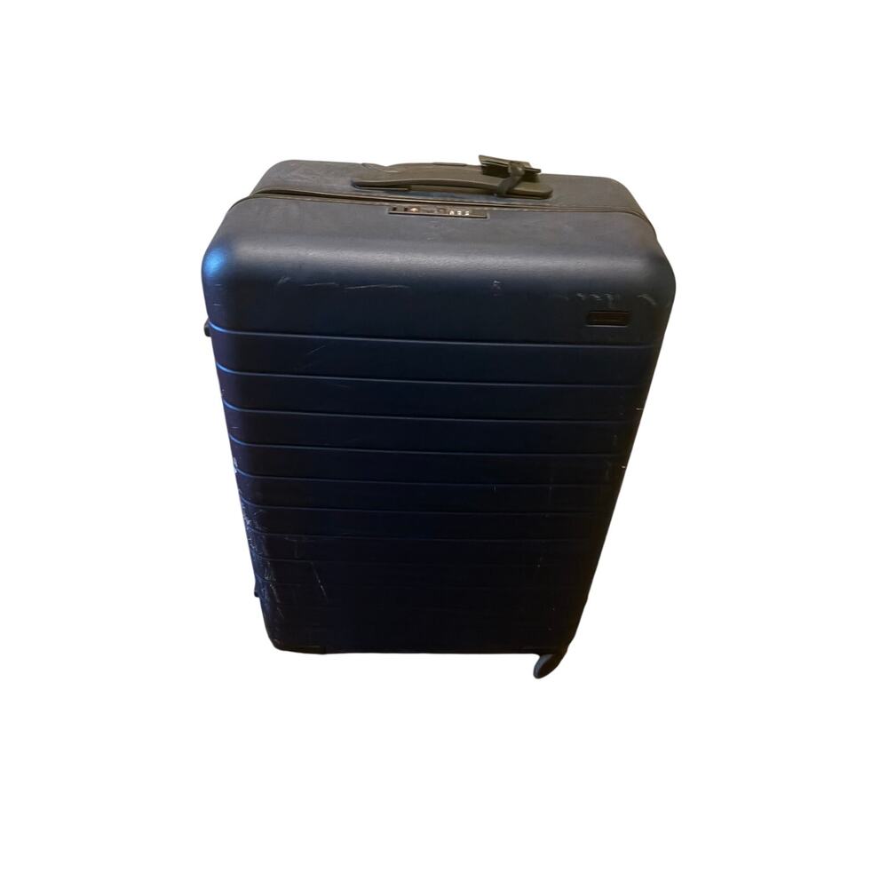 Away navy blue medium luggage 25x18x10